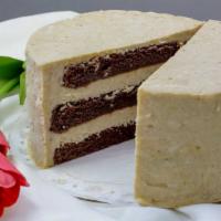 German Chocolate · Three layers of chocolate cake filled with the traditional filling of ground walnuts and coc...