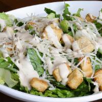Caesar Salad · Crisp romaine lettuce tossed with homestyle croutons, grated Parmesan cheese and caesar dres...