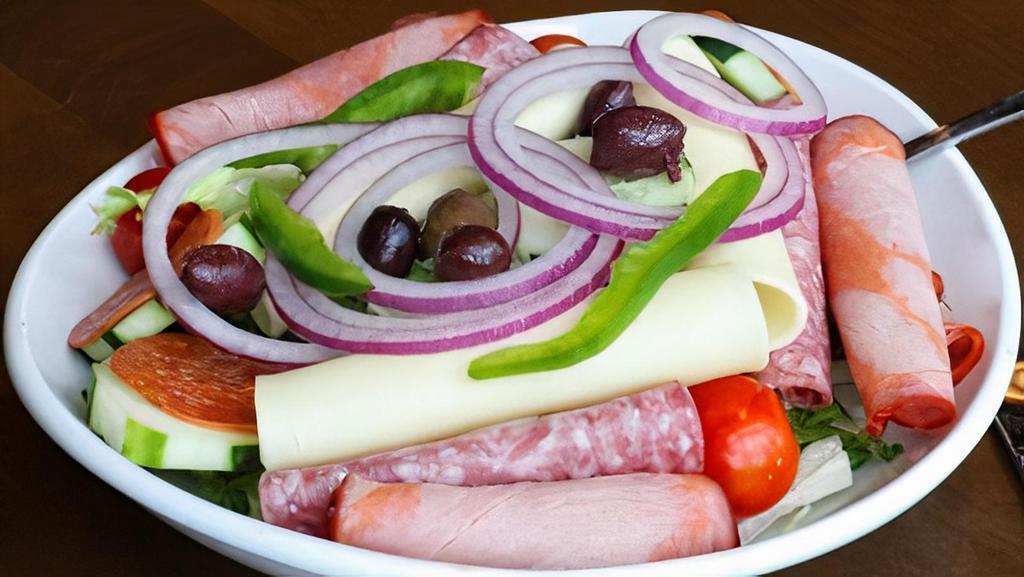 Antipasto · Genoa salami, capicola ham, pepperoni, kalamata olives, peppers, onions, fresh vegetables, and Provolone cheese, served on a bed of mixed greens.