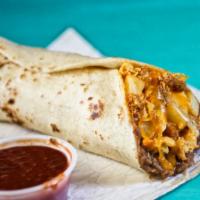 El Campeon · Signature chorizo & egg, fried potatoes, refried beans, and shredded cheese wrapped in a fre...