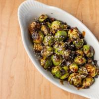 Brussel Sprouts · Seasoned, crispy brussel sprouts sauteed in olive oil.