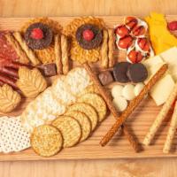 Charcuterie Board · Our custom boards are great for two+ people to share! Comes with a variety of meat, vegetabl...