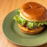 Southwest Turkey Burger · Grilled turkey burger mixed with peppers, onion, garlic, and herbs. Served on buns with lett...