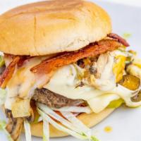 Texas Big Burger · Sautéed onions, mushrooms, jalapeños, bell peppers, bacon, American and provolone cheese, ma...
