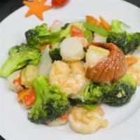 Seafood Combination  · Lobster meat, crab meat, jumbo shrimp, scallops with many kinds of fresh vegetables in tasty...