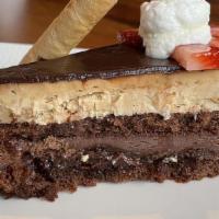 Chocolate Mousse Cake · fresh strawberry, crisp wafer, chantilly cream, chocolate sauce.