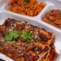 Chipotle Pepper Pulled Pork Enchiladas · Come with Spanish Rice and Beans