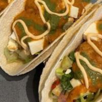 Tandoori Paneer Street Tacos · Tandoori cooked paneer with tomato-cucumber relish, mint chimichurri and house spices.