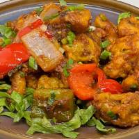 Chili Chicken · juicy onions, indian chili's tossed with chef special masala