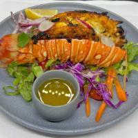 Tandoori Lobster · lobster with fresh yogurt ,cardamom powder, ginger, garlic, butter and chef's grounded masala