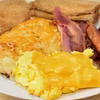 Big Man · 3 X-Large eggs, hash browns or grits, smoked ham two sausage links and two bacon served with...