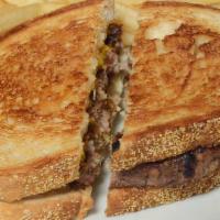 Patty Melt · Served with Swiss and American cheese on grilled rye bread with grilled onions.