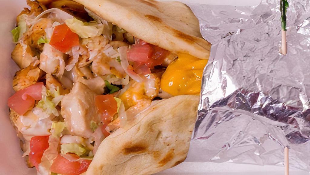 Grilled Chicken Pita · Marinated chunks of chicken with lettuce, tomato, and mayo or ranch.