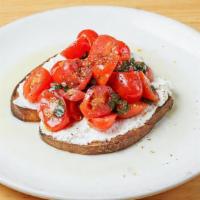 Bruschetta · Toasted Homemade Bread, Ricotta, Cherry Tomatoes, Basil, Garlic