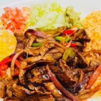Plate #4 Beef Fajitas · Served with rice, salad sour cream guacamole tomatoes, pinto beans and flour or corn tortill...