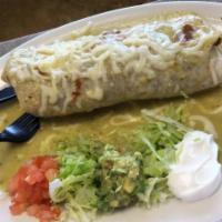 Smothered Burrito · Flour tortilla, with your choice of meat with cheese, rice, beans inside, smothered with gre...
