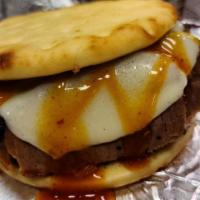Smokin' Brisket Sammich · Beef brisket with provolone cheese and mango habanero on naan bread.  Served with your choic...