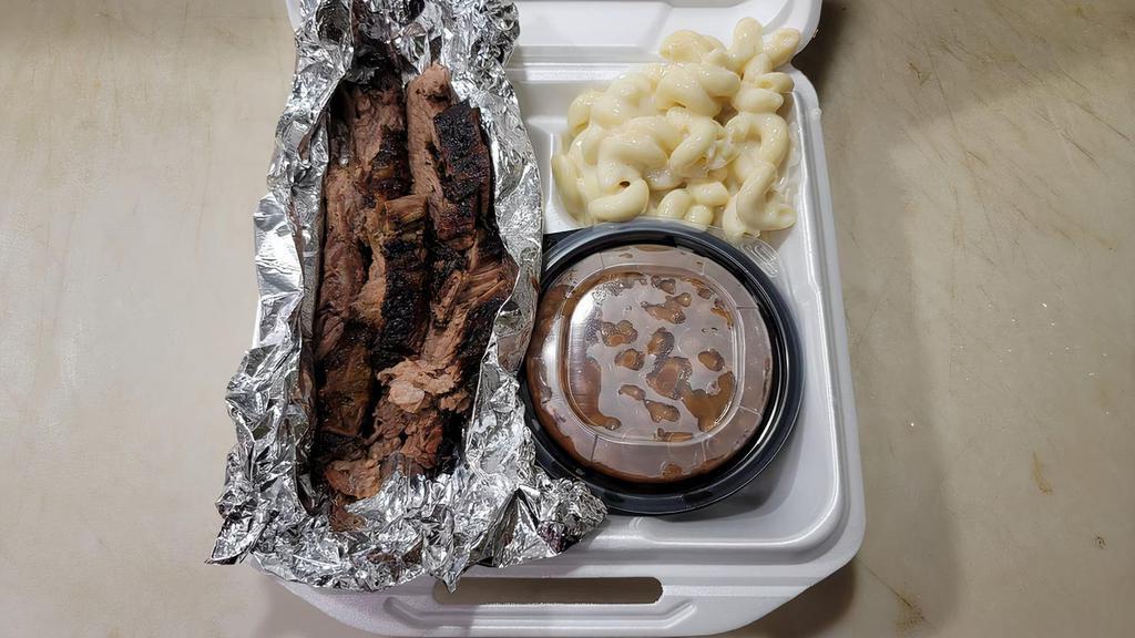 Beef Brisket Plate · Hearty serving of smoked beef brisket served with two sides.  *PLEASE NOTE WE DO NOT START PREPARING FOOD UNTIL A DRIVER IS ASSIGNED.  We do this to make sure your food stays hot and fresh when you receive it.