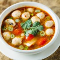 Tom Yum Soup · Lemongrass soup with cilantro, green onion, mushroom and tomatoes.