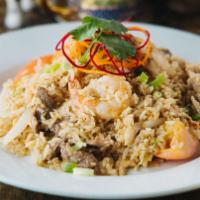 Combination Fried Rice · Fried rice with chicken, pork, beef, shrimp, onions & tomatoes.