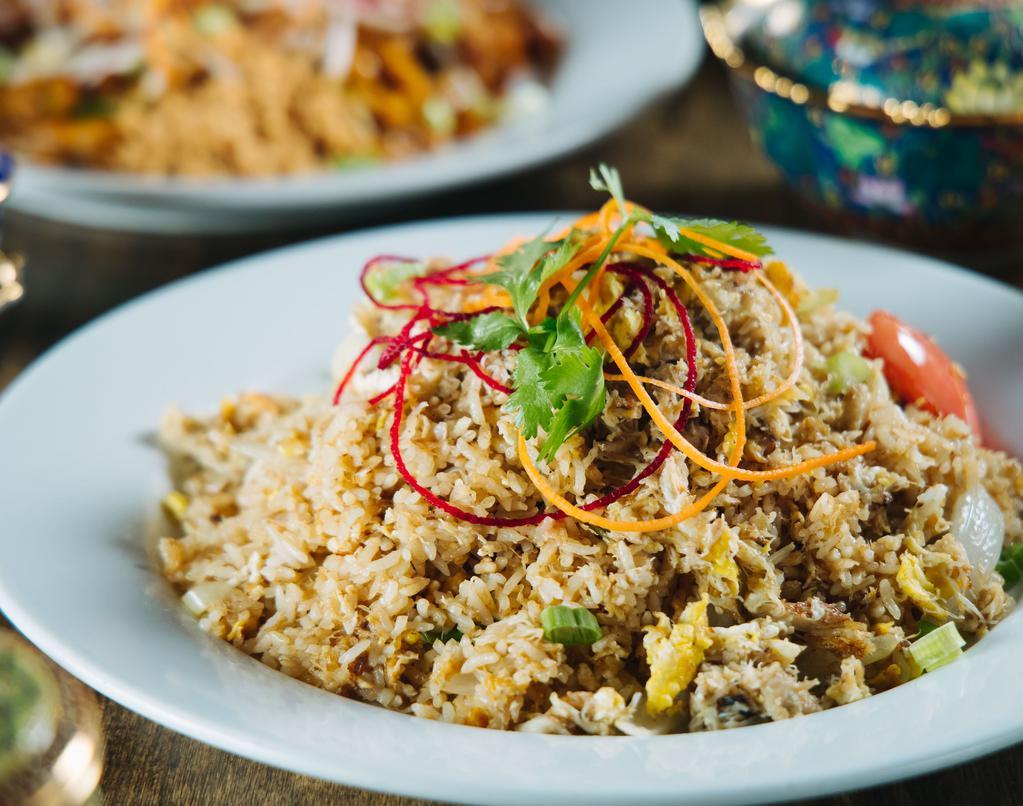Crab Fried Rice · Fried rice with crab meat, eggs, onions & tomatoes.