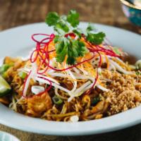 Pad Thai · Thin rice noodles, bean sprouts, tofu, eggs, crushed peanuts, scallions in a sweet tamarind ...