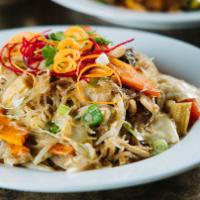 Pad Woon Sen · Glass noodles, eggs, cabbage, baby corn, onion,  sprouts & carrots in garlic soy sesame sauce.