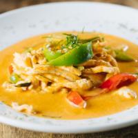 Panang Curry · Panang curry with bell peppers and kaffir lime leaves in coconut milk. Served with steamed r...