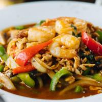 Shrimp & Chicken Basil · Minced chicken and shrimp tossed with chilies, bell peppers, and fresh basil. Served with st...