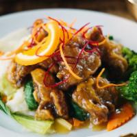 Orange Beef · Crispy beef with flavored citrus Orange and steamed veggies. Served with steamed rice.