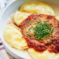 Cheese Ravioli · Traditional house-made, ricotta-filled ravioli in our marinara sauce and finished with fresh...