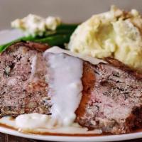 Meatloaf & Gravy · A blend of beef and veal mixed with mushrooms and panko breadcrumbs, topped with white & bro...