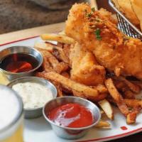 Fish & Chips · A traditional fish & chips feast. Fresh cod battered and lightly fried with Old Bay and serv...