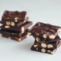 Virginia Peanut Chocolate Bark · Hand-cooked peanuts from family owned & operated, Belmont Peanuts. 1/2 lb.
