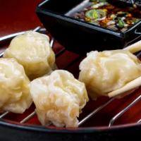 Shumai (4 Pieces) · Steamed shrimp and vegetable dumplings.