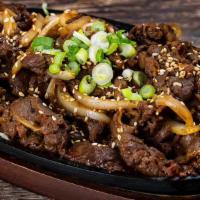 Bulgogi Tapas · Pan fried thinly sliced sweet marinated beef with onions.