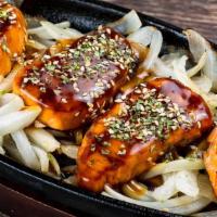 Grilled Salmon Tapas · Fresh grilled salmon with teriyaki sauce.