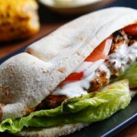 Lamb Kofta Pita · Ground lamb meat seasoned in our special spices and basted in your choice of peri peri sauce...