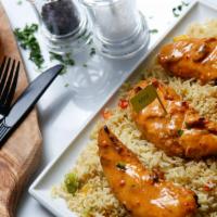 Chicken Strip Rice · Marinated chicken tender loins in Portuguese Peri Peri sauce then flame grilled to order in ...