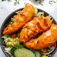 Peri Chicken Strip Salad · Marinated chicken tender loins in Portuguese Peri Peri sauce then flame grilled to order in ...