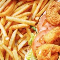 Shrimp Po-Boy Sandwich · Hand breaded fried shrimp served in a baguette with tartar sauce.