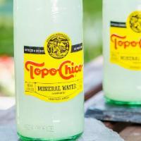 Topo Chico · Sparkling mineral water.