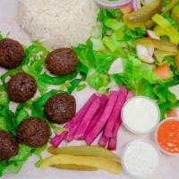 Falafel · Vegetarian patties (4 pieces) with either basmati rice or French fries, plus three toppings ...