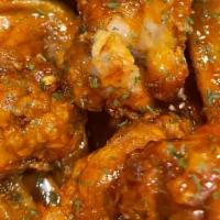 Hot Honey Wings 3 Piece Whole · comes with two sides. (Mild hot honey sauce)