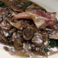 Veal Saltimbocca Focaccia · Tender veal medallions sautéed in butter with marsala wine sauce topped with fresh spinach, ...