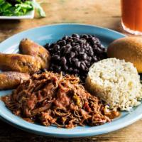 Pabellón Ropa Vieja · Gluten free. Hand-shredded beef or chopped marinated chicken breast served with steam rice, ...