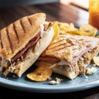 Cuban Sandwich · Pulled pok, ham, swiss cheese, pickles and mustard.