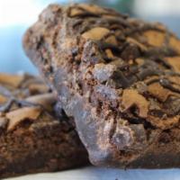 Chocolate Chunk Brownie · Slow melted chocolate blended with rich chocolate chunks and drizzled in fudge.