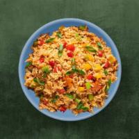 Veggie Fried Rice · Long grained basmati rice cooked with assorted vegetables in an Indo-Chinese style.