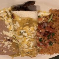 Burrito De Carne Asada · Filled with sirloin steak or chicken then smothered with cheese, tomatillo sauce, and pico d...